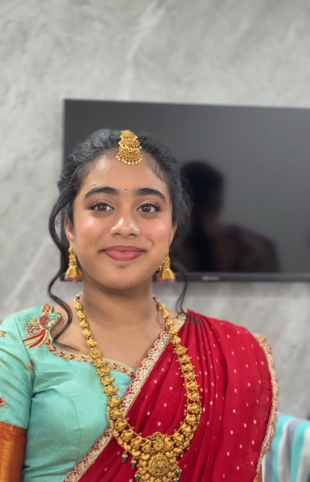 Light makeup and hair for a half saree ceremony